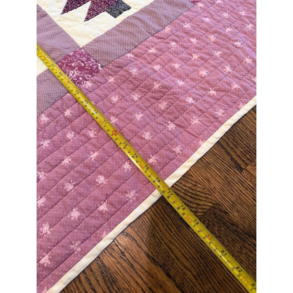 Quilt. Hand quilted.